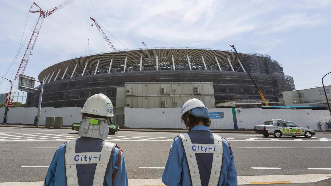 Bauarbeiten am Nationalstadion von Tokio, in dem die Spiele 2020 zu einem großen Teil ausgetragen werden. Bauarbeiten am Nationalstadion von Tokio, in dem die Spiele 2020 zu einem großen Teil ausgetragen werden.