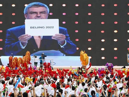 Jubel in Peking nach Bekanntgabe des Zuschlags für die Olympischen Winterspiele 2022.