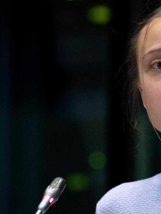 Swedish climate activist Greta Thunberg speaks during a meeting at the European Parliament in Brussels on March 4, 2020, on the day the European Union unveils a landmark law to achieve "climate neutrality" by 2050. - The Swedish eco-warrior, who is in the Belgian capital for a March 6 protest, attended a meeting of European Commissioners, the top EU officials who will greenlight the draft law, and will appear before a European Parliament committee. (Photo by Kenzo TRIBOUILLARD / AFP)
