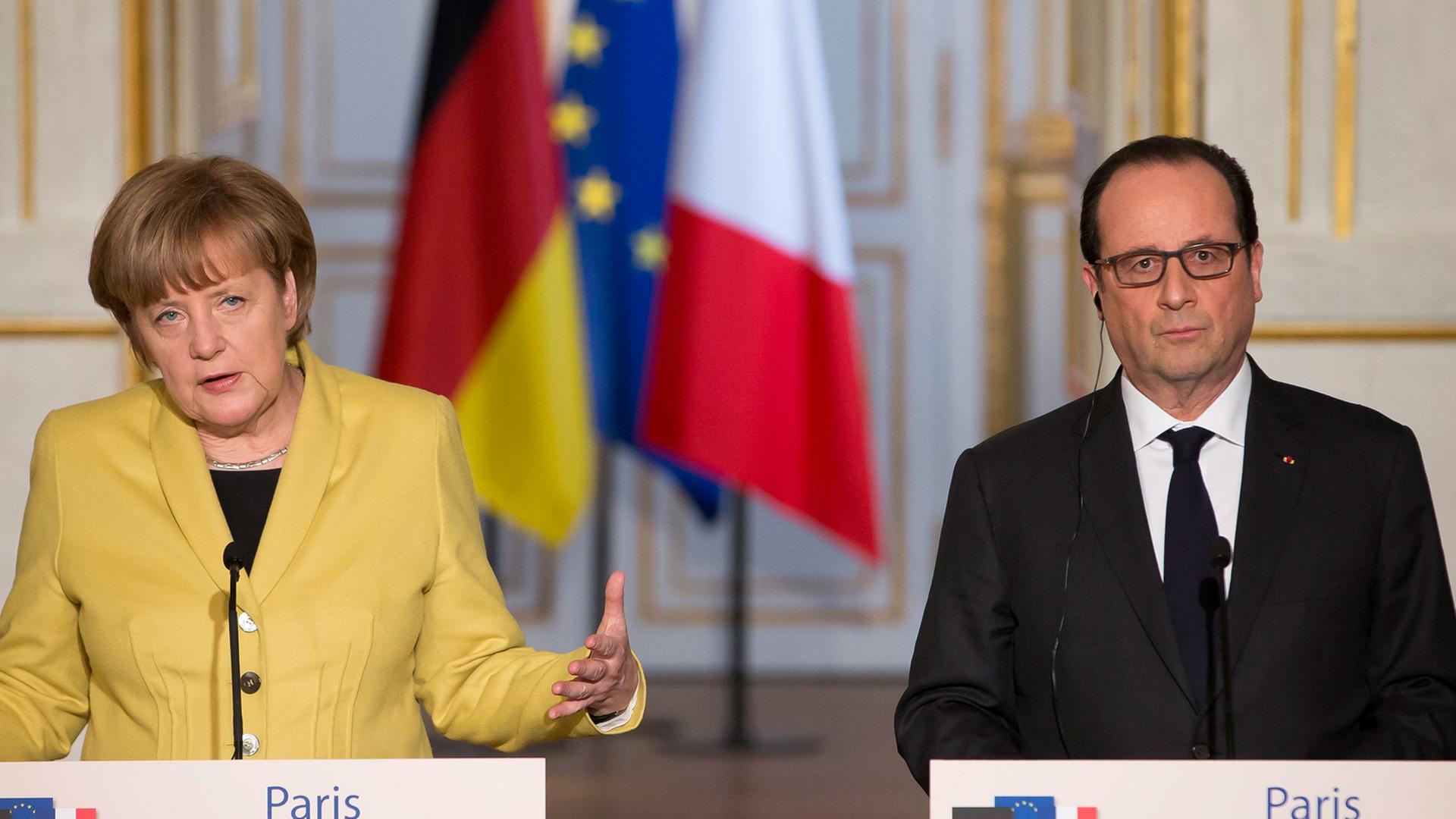 Bundeskanzlerin Angela Merkel und der französische Präsident Francois Hollande in Paris