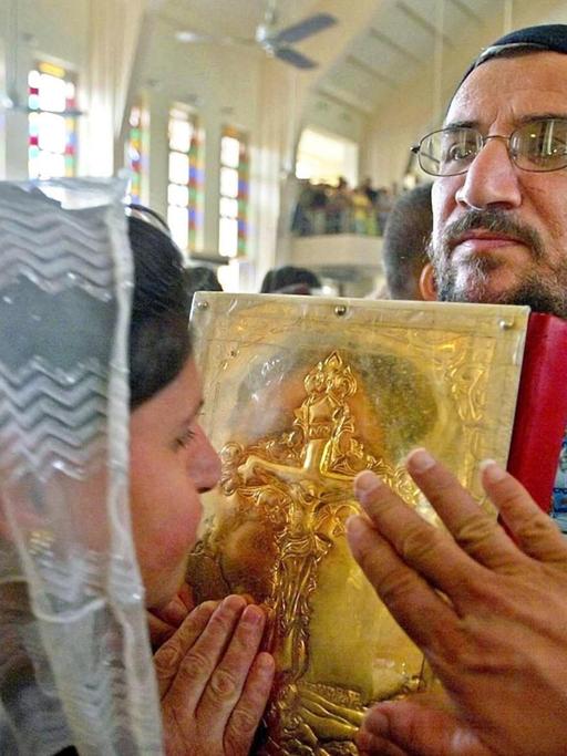 Orthodoxe Christen aus dem Irak feiern Ostern