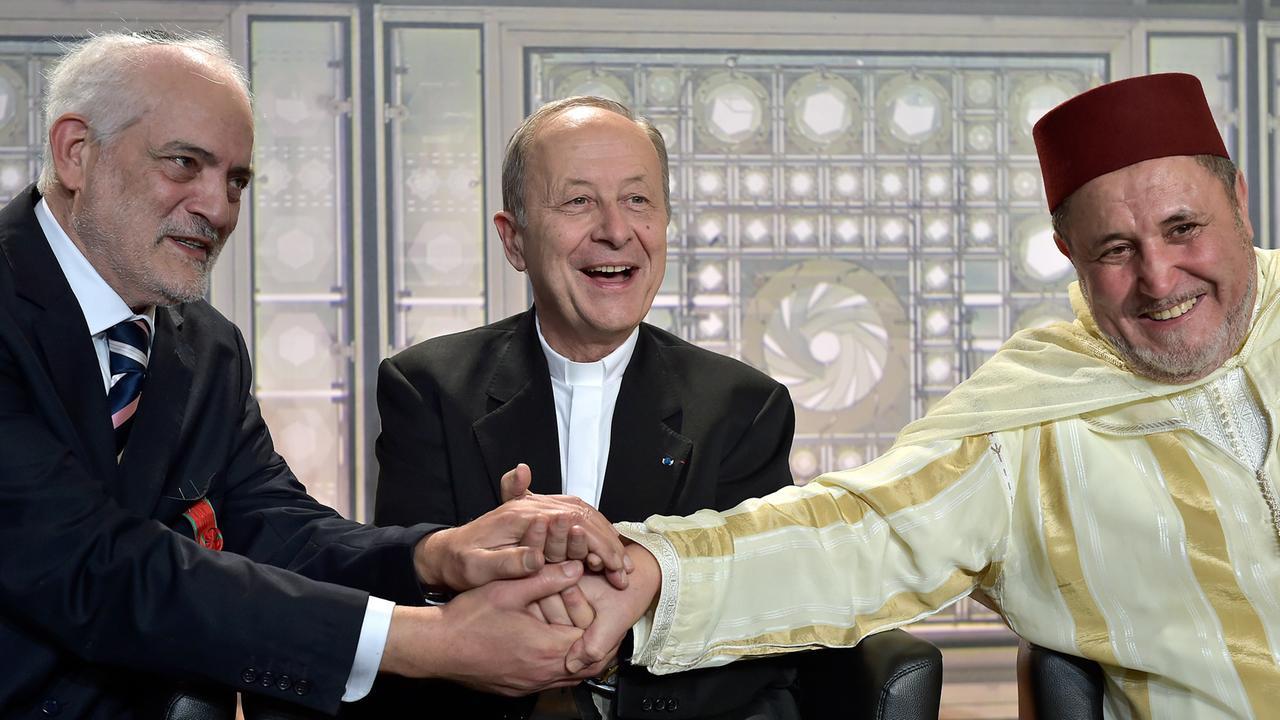 Der Rabbi von Ris-Orangis, Michel Serfaty, der Bischof von Èvry, Michel Dubost, und Khalil Merroun, Iman der muslimischen Gemeinde von Evry Der Rabbi von Ris-Orangis, Michel Serfaty, der Bischof von Èvry, Michel Dubost, und Khalil Merroun, Iman der muslimischen Gemeinde von Evry
