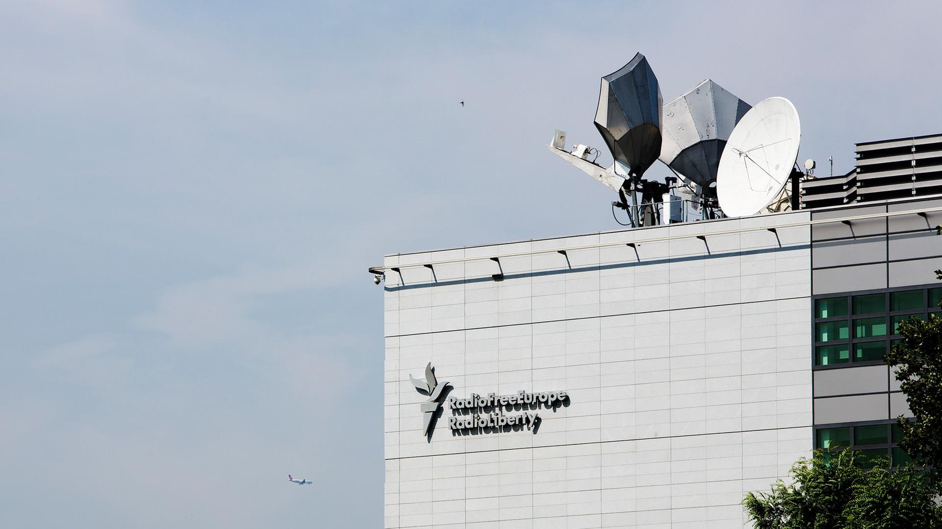Logo and satellite dishes at the headquarters of Radio Free Europe/Radio Liberty (RFE/RL) in Prague, Czech Republic, July 18, 2013. Logo and satellite dishes at the headquarters of Radio Free Europe/Radio Liberty (RFE/RL) in Prague, Czech Republic, July 18, 2013.