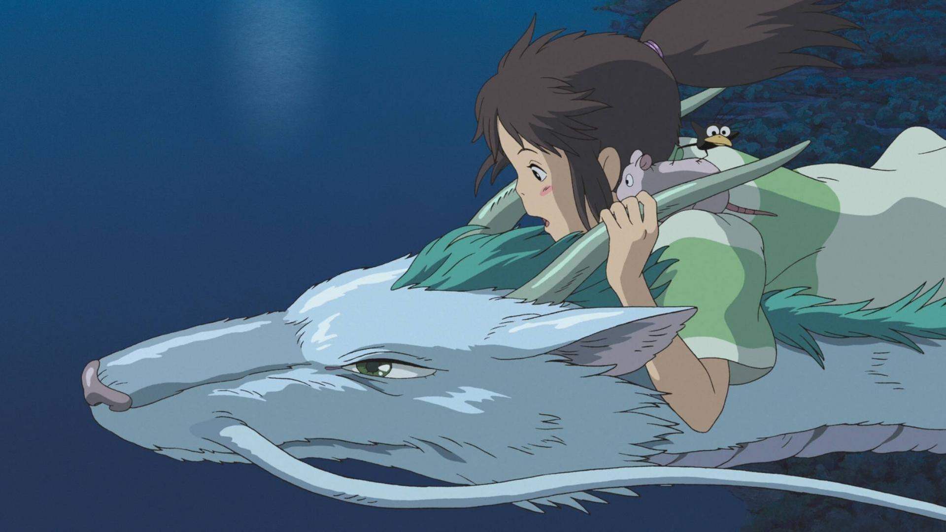 Chihiro reitet auf dem Flugdrachen Haku. Chihiro reitet auf dem Flugdrachen Haku.