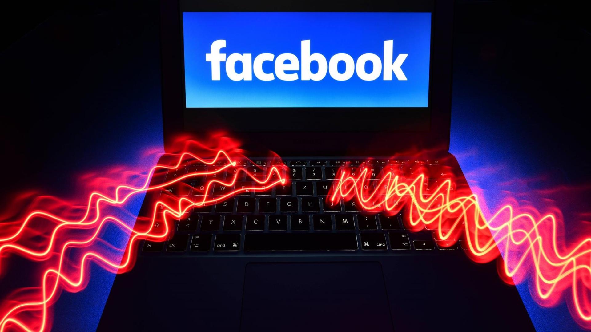 Auf dem Monitor eines Laptops, in den rote elektrische Blitze einschlagen, steht "facebook". Auf dem Monitor eines Laptops, in den rote elektrische Blitze einschlagen, steht "facebook".
