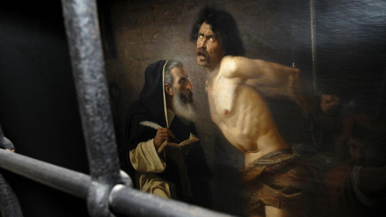 Ein Gemälde zeigt ein Verhör während der Inquisition, zu sehen im Waldenser Museum in Torre Pellice, Italien