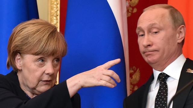 Bundeskanzlerin Angela Merkel und der russische Präsident Wladimir Putin bei der Pressekonferenz im Kreml.