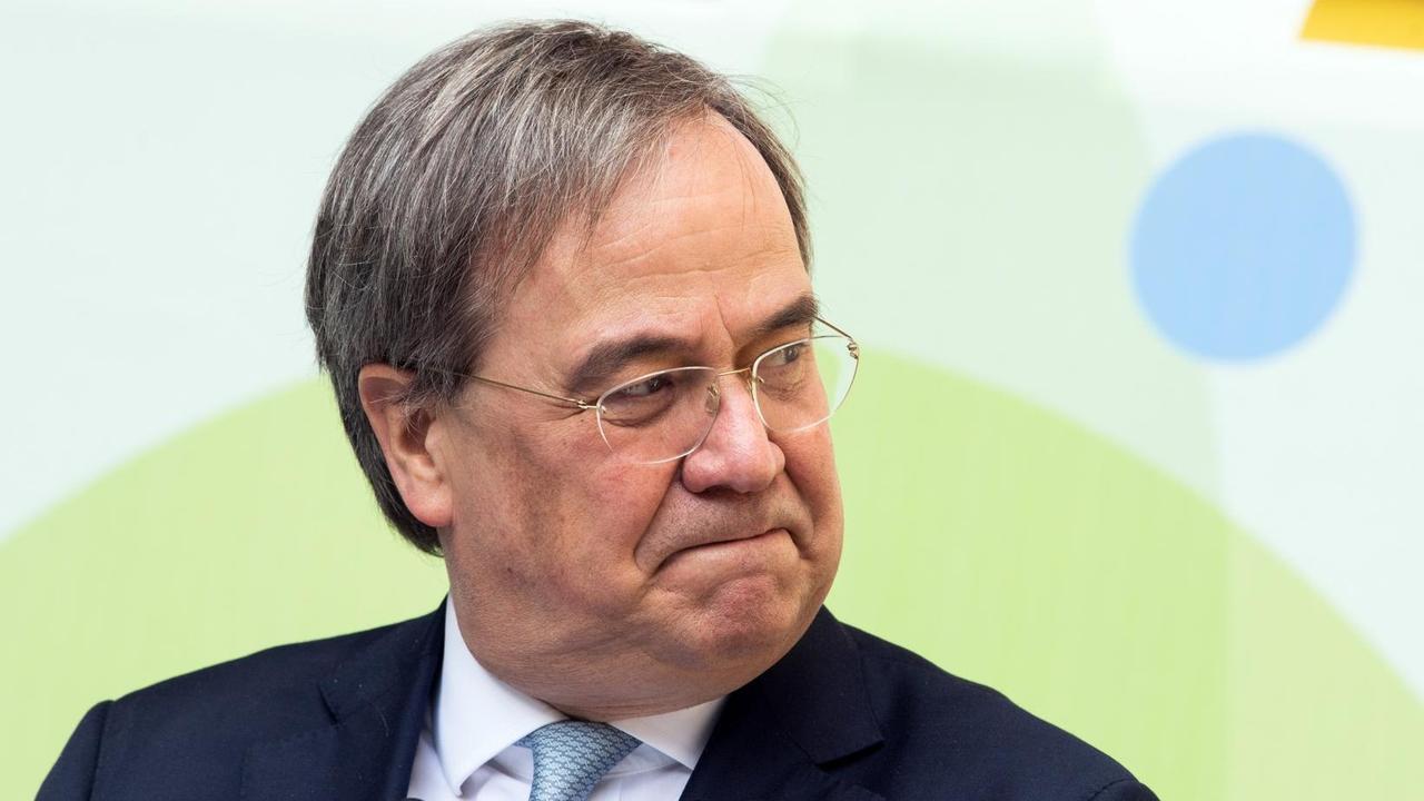Armin Laschet kneift den Mund zusammen. Armin Laschet kneift den Mund zusammen.