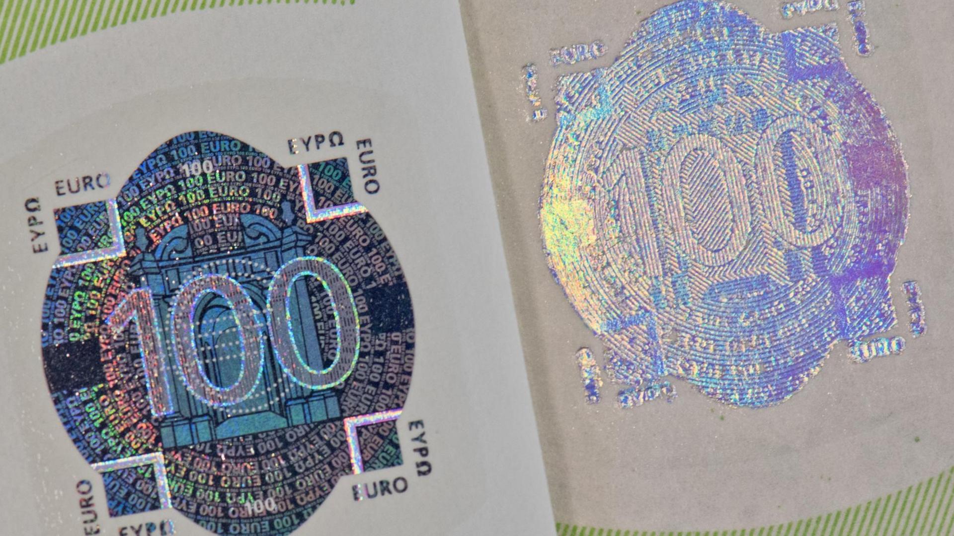 Ein echter und ein falscher 100-Euro-Schein
