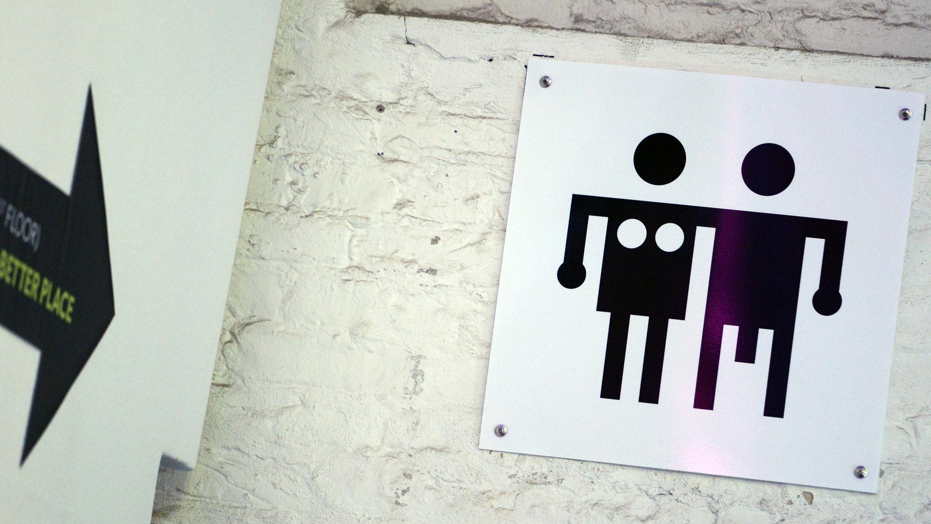 Ein Piktogramm für Männer- und Frauen-Toiletten Ein Piktogramm für Männer- und Frauen-Toiletten