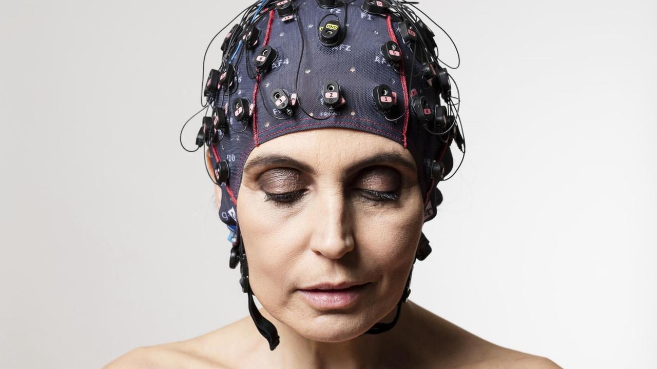 In this image released on Tuesday, June 13, 2017, electrodes measure brain activity to tell if a patient is conscious and, if so, to let them communicate via mindBEAGLE. mindBEAGLE is the very first and only EEG-based Brain-Computer Interface (BCI) that enables communication with patients who suffer from locked-in syndrome (LIS), complete locked-in syndrome (CLIS) or disorders of consciousness (DOC). It is widely known that these patients need BCIs that do not rely on visual stimuli and are easy to use. Paradigms based on non-visual evoked potentials and motor imagery can be effective for these patients. Therefore, mindBEAGLE has been developed and works with auditory, vibro-tactile (both based on P300) and motor-imagery paradigms in less than 20 minutes. For further information visit http://www.apmultimedianewsroom.com/newsaktuell. (Florian Voggeneder/Guger Technologies) | In this image released on Tuesday, June 13, 2017, electrodes measure brain activity to tell if a patient is conscious and, if so, to let them communicate via mindBEAGLE. mindBEAGLE is the very first and only EEG-based Brain-Computer Interface (BCI) that enables communication with patients who suffer from locked-in syndrome (LIS), complete locked-in syndrome (CLIS) or disorders of consciousness (DOC). It is widely known that these patients need BCIs that do not rely on visual stimuli and are easy to use. Paradigms based on non-visual evoked potentials and motor imagery can be effective for these patients. Therefore, mindBEAGLE has been developed and works with auditory, vibro-tactile (both based on P300) and motor-imagery paradigms in less than 20 minutes. For further information visit http://www.apmultimedianewsroom.com/newsaktuell. (Florian Voggeneder/Guger Technologies) |