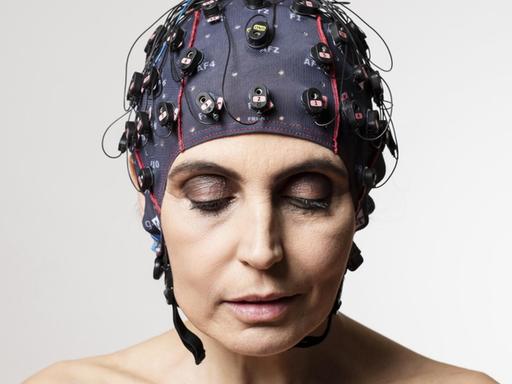 In this image released on Tuesday, June 13, 2017, electrodes measure brain activity to tell if a patient is conscious and, if so, to let them communicate via mindBEAGLE. mindBEAGLE is the very first and only EEG-based Brain-Computer Interface (BCI) that enables communication with patients who suffer from locked-in syndrome (LIS), complete locked-in syndrome (CLIS) or disorders of consciousness (DOC). It is widely known that these patients need BCIs that do not rely on visual stimuli and are easy to use. Paradigms based on non-visual evoked potentials and motor imagery can be effective for these patients. Therefore, mindBEAGLE has been developed and works with auditory, vibro-tactile (both based on P300) and motor-imagery paradigms in less than 20 minutes. For further information visit http://www.apmultimedianewsroom.com/newsaktuell. (Florian Voggeneder/Guger Technologies) |