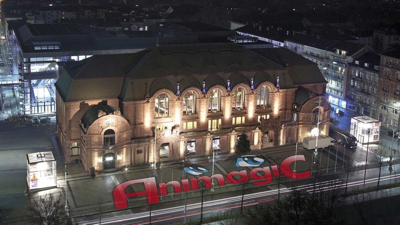 Der Rosengarten in Mannheim bei Nacht mit dem Animagic-Logo Der Rosengarten in Mannheim bei Nacht mit dem Animagic-Logo