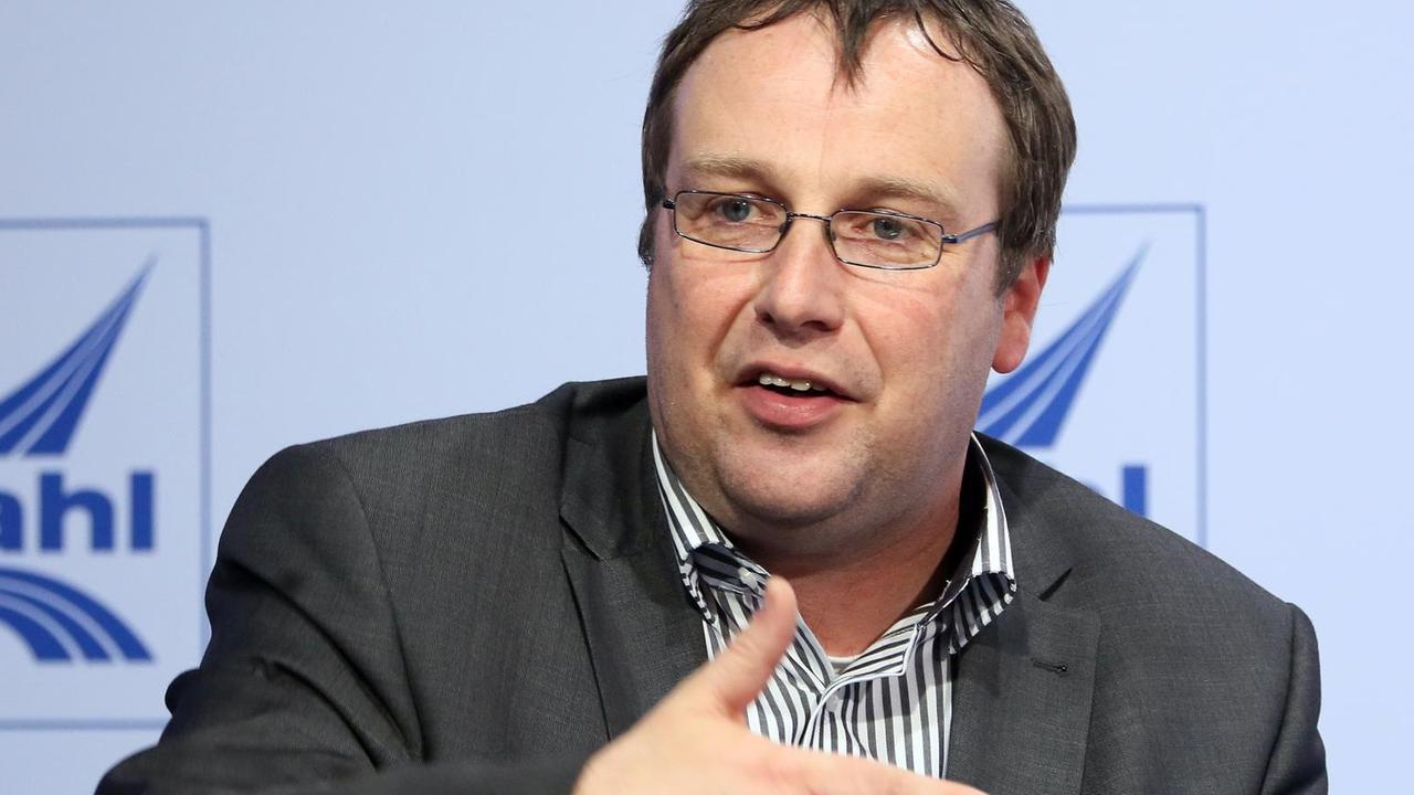 Der Grünen-Politiker Oliver Krischer spricht bei einem Vortrag. Der Grünen-Politiker Oliver Krischer spricht bei einem Vortrag.
