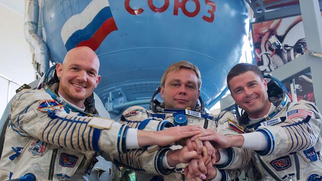 Die ISS-Besatzung Alexander Gerst, Maxim Surayev, Reid Wiseman