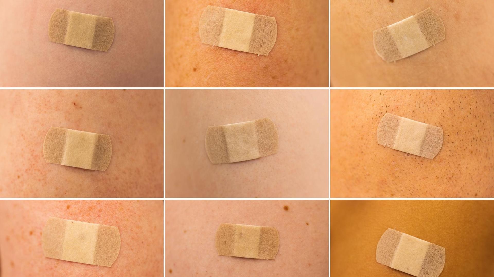 Verschiedene Menschen haben nach ihrer Impfung gegen den Coronavirus ein Pflaster auf dem Oberarm. Close Up auf die Oberarme mit kleinem Pflaster. Verschiedene Menschen haben nach ihrer Impfung gegen den Coronavirus ein Pflaster auf dem Oberarm. Close Up auf die Oberarme mit kleinem Pflaster.