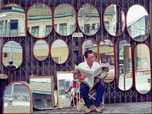 Spiegelverkäufer in Thailand