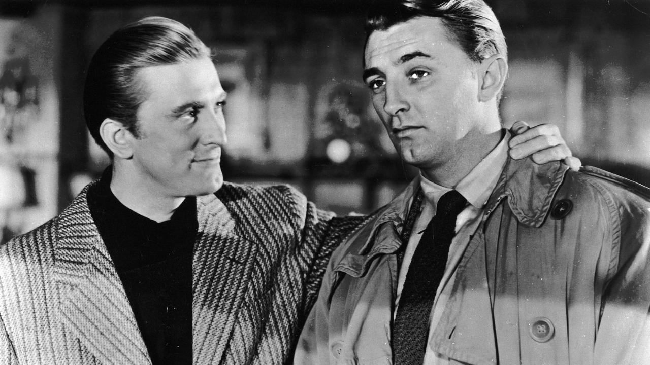Kirk Douglas (r) und Robert Mitchum in "Goldenes Gift" von Jaques Tourneur. Kirk Douglas (r) und Robert Mitchum in "Goldenes Gift" von Jaques Tourneur.