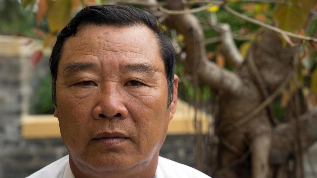 Phan Tanh Cong war elf Jahre alt, als die US-Amerikaner sein Dorf My Lai abschlachteten. Foto: Bennett Murray/dpa | Verwendung weltweit