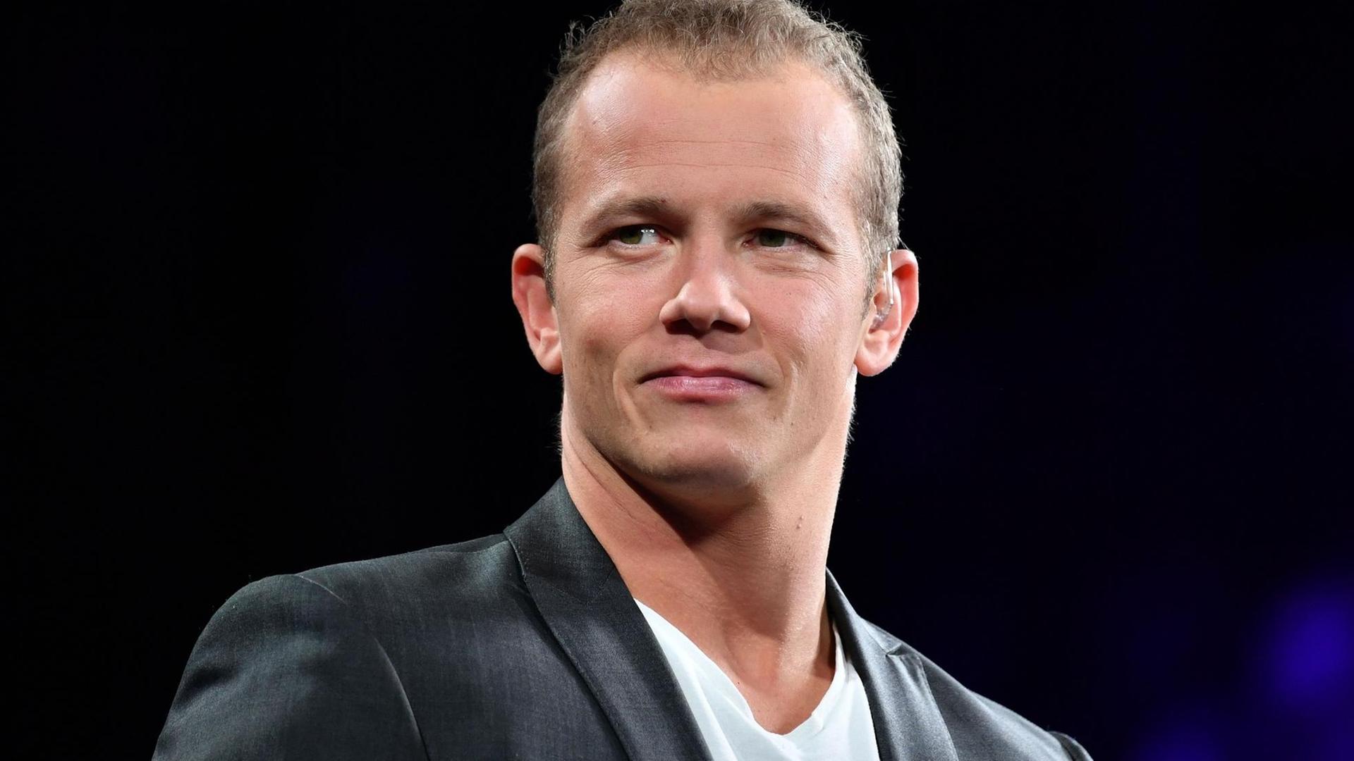 Als WM-Botschafter in der Halle: Der ehemalige deutsche Turner und Olympiasieger Fabian Hambüchen bei der Turn-WM 2019 in Stuttgart. Als WM-Botschafter in der Halle: Der ehemalige deutsche Turner und Olympiasieger Fabian Hambüchen bei der Turn-WM 2019 in Stuttgart.