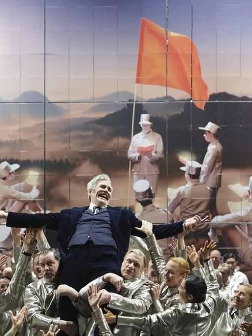 Michael Mayes und Ensemble in "Nixon in China" an der Staatsoper Stuttgart.