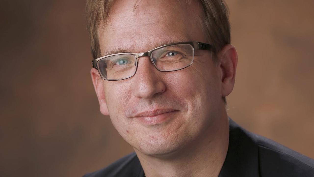 Porträt von Torben Lütjen. Porträt von Torben Lütjen.