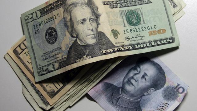 Konterfei von US-Präsident Jackson und Mao Zedong auf US-amerikanischer 20-Dollar-Note und chinesischem 10-Renminbi-Schein.