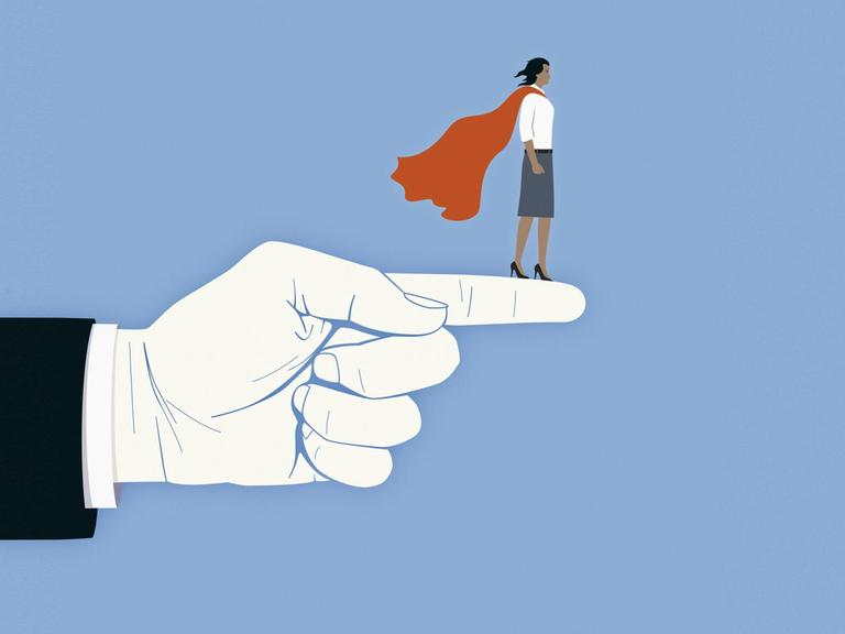 Eine Frau mit einem Heldenumhang steht auf einem ausgestrekten Zeigefinger. (Illustration)