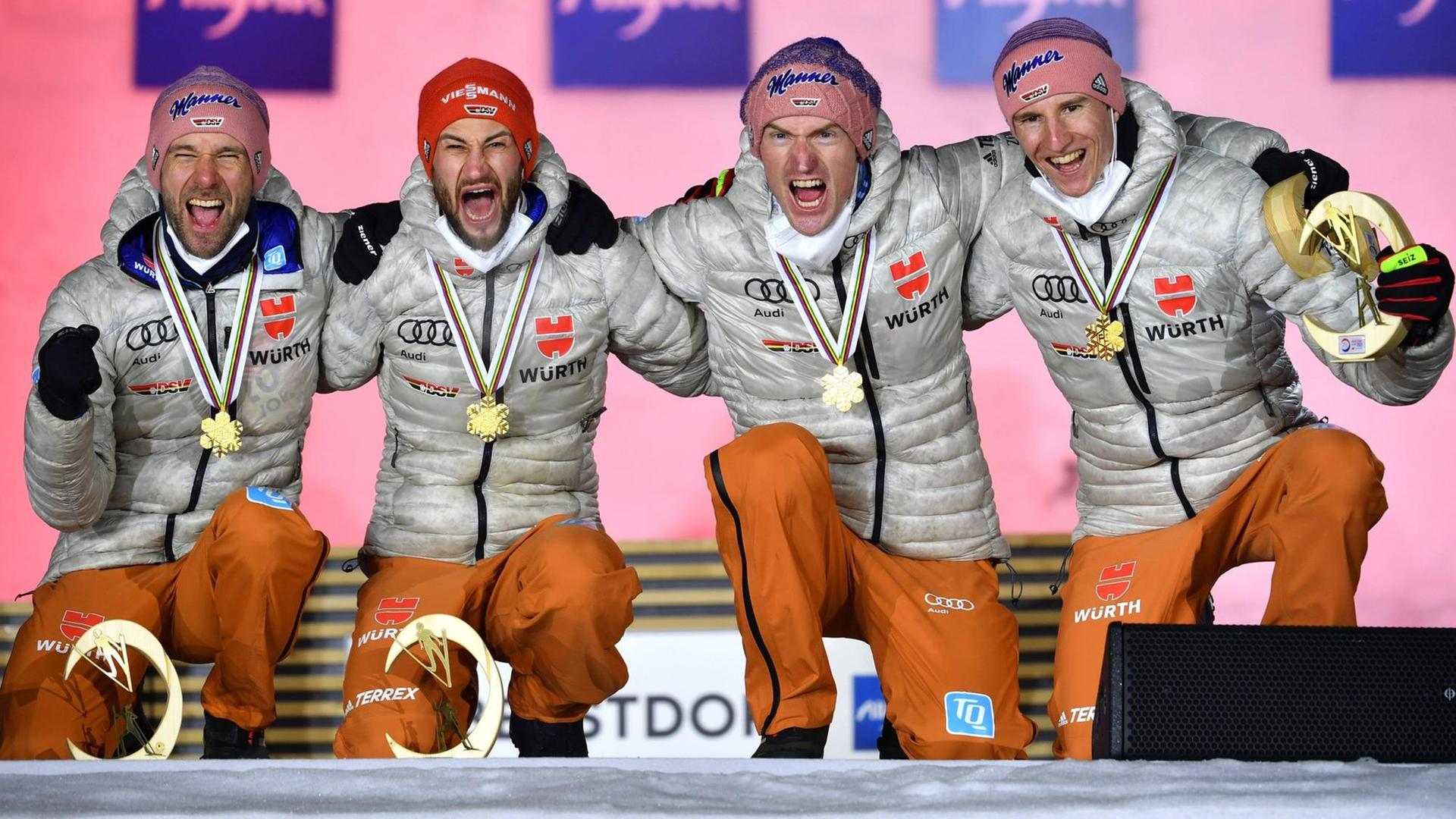 Die deutschen Ski-Springer haben die Gold-Medaille im Team-Wettbewerb gewonnen. Die deutschen Ski-Springer haben die Gold-Medaille im Team-Wettbewerb gewonnen.