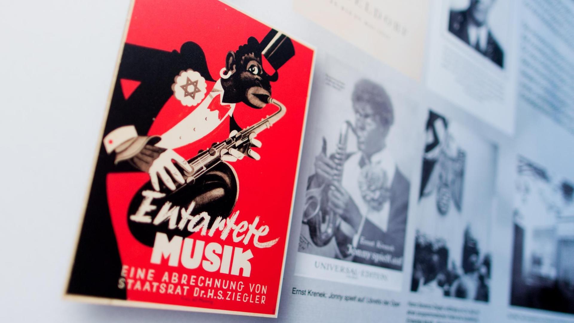 Verschiedene Bilder sind am 06.01.2014 in der Ausstellung "Entartete Musik" in der Tonhalle in Düsseldorf (Nordrhein-Westfalen) auf einer Stellwand zu sehen. Verschiedene Bilder sind am 06.01.2014 in der Ausstellung "Entartete Musik" in der Tonhalle in Düsseldorf (Nordrhein-Westfalen) auf einer Stellwand zu sehen.