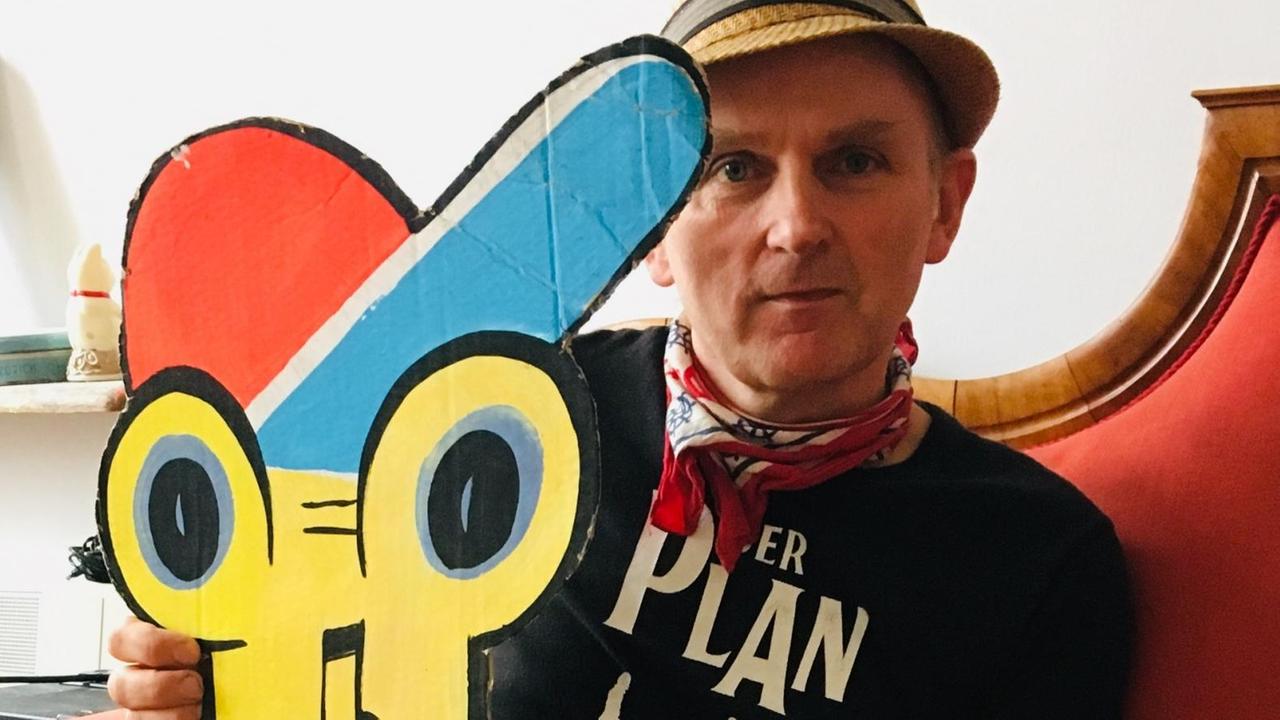 In den Bildern des Pop-Art Künstlers Jim Avignon taucht der Tod immer mal wieder auf: Als ein Typ, der in der Ecke steht und wartet. In den Bildern des Pop-Art Künstlers Jim Avignon taucht der Tod immer mal wieder auf: Als ein Typ, der in der Ecke steht und wartet.