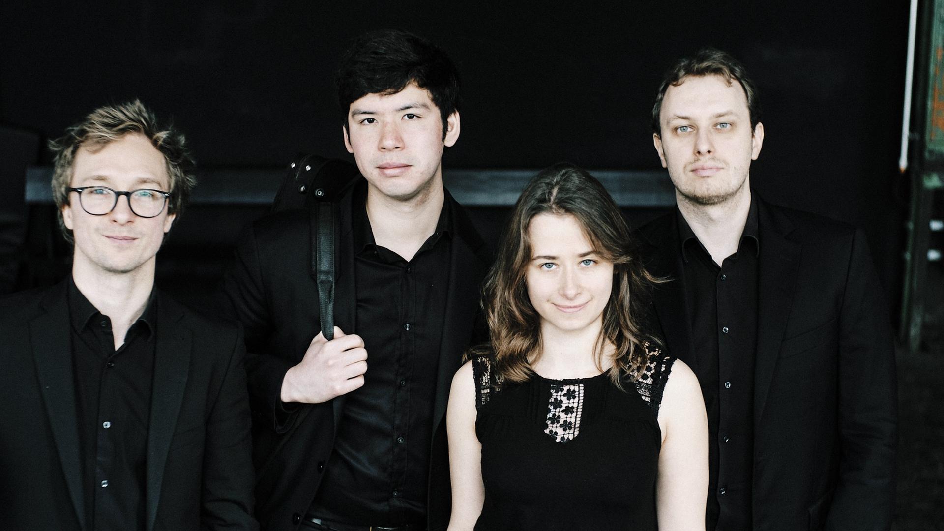 Porträt der vier Musiker ohne Instrumente Porträt der vier Musiker ohne Instrumente