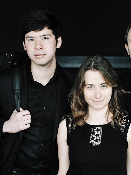 Porträt der vier Musiker ohne Instrumente