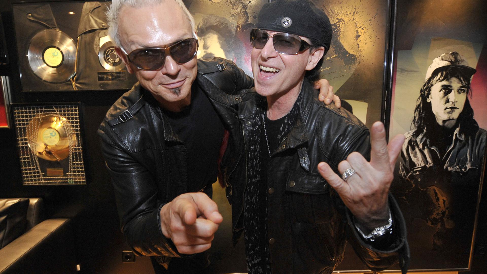 Lead singer Klaus Meine (R) and lead guitarist Rudolf Schenker of the iconic German heavy metal band Scorpions, 2009. Lead singer Klaus Meine (R) and lead guitarist Rudolf Schenker of the iconic German heavy metal band Scorpions, 2009.
