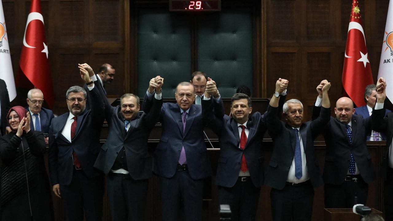Turkey President Recep Tayyip Erdogan accepts new members to his party during Justice and Development Party weekly parliamentary meeting in Ankara, Turkey on February 19, 2020.