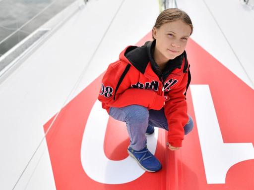 Die schwedische Klimaaktivistin Greta Thunberg posiert für ein Foto während eines Interviews mit AFP an Bord der Segelyacht Malizia II in der Mayflower Marina in Plymouth, Südwestengland, am 13. August 2019 vor ihrer Reise über den Atlantik nach New York.