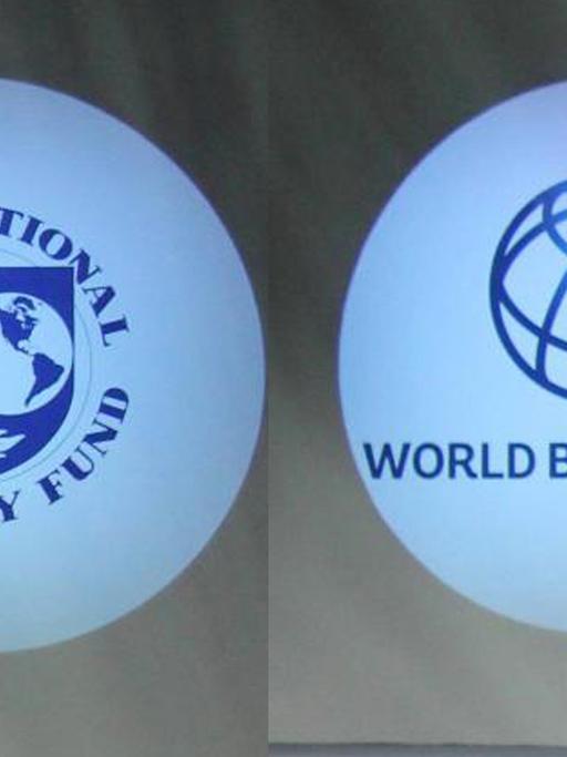 Die Logos des IWF und der Weltbank.