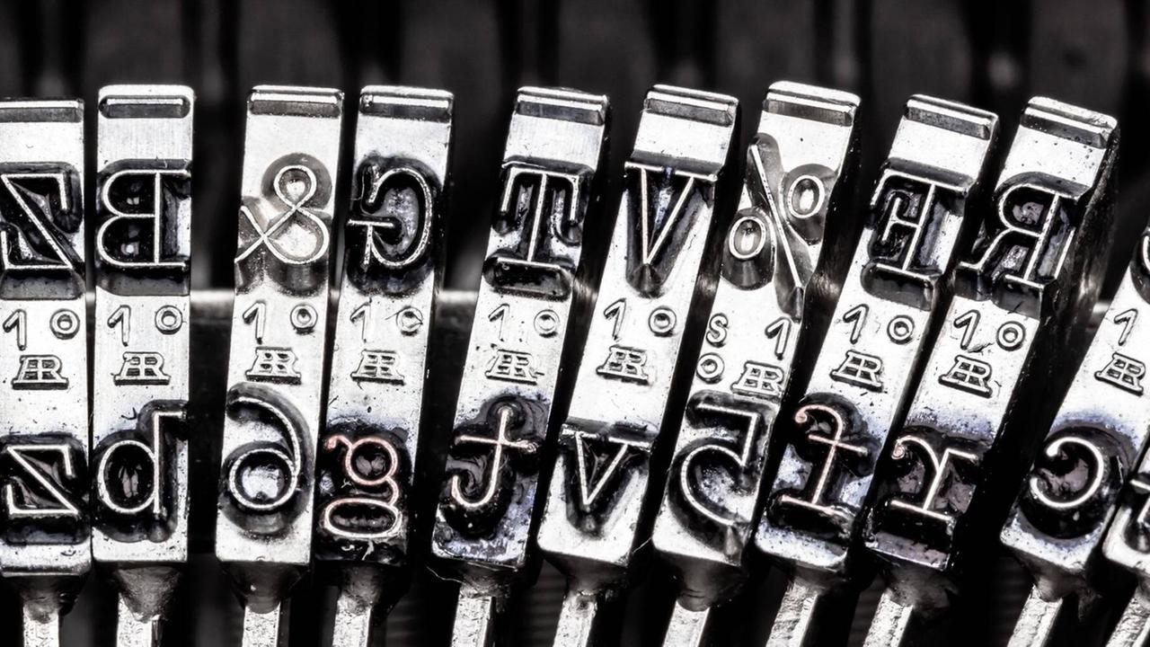 Buchstaben einer alten Schreibmaschine. Buchstaben einer alten Schreibmaschine.