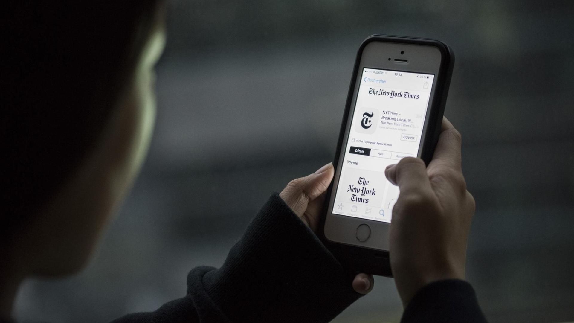 Auf einem iPhone ist die New-York-Times-App von Apple zu sehen. Auf einem iPhone ist die New-York-Times-App von Apple zu sehen.