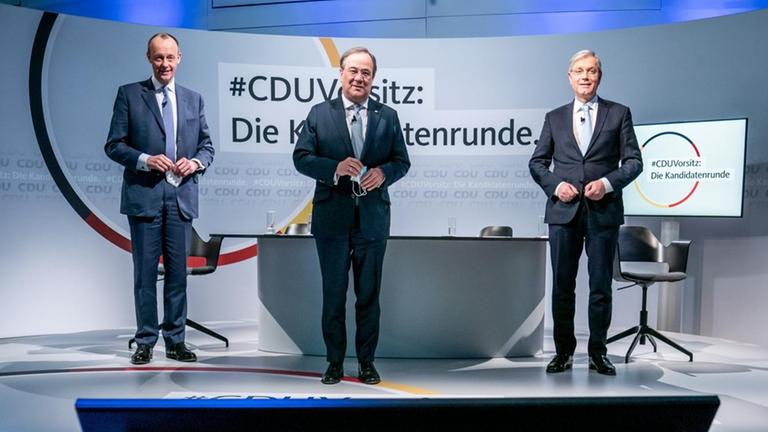 Die drei Kandidaten für den CDU-Parteivorsitz Friedrich Merz, Armin Laschet und Norbert Röttgen stehen nach einer Diskussionsrunde im Konrad-Adenauer-Haus (von links nach rechts). 