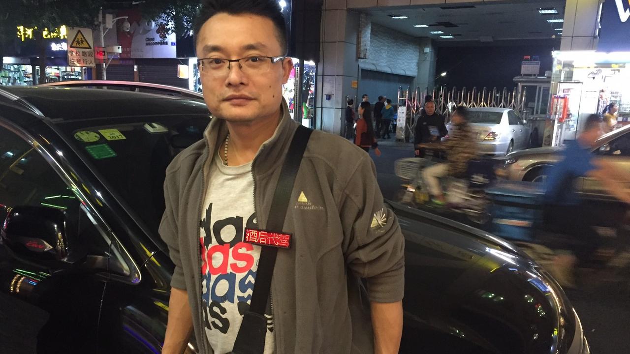 Der Miet-Taxifahrer Leyuan Lu Der Miet-Taxifahrer Leyuan Lu