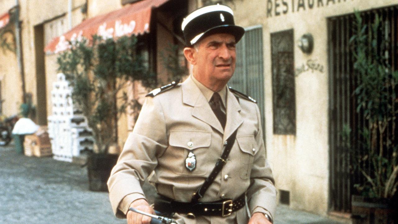 Der französische Komiker Louis de Funes in seiner Paraderolle als Gendarm von St. Tropez in dem Film "Louis und seine verrückten Politessen" aus dem Jahr 1983. Der französische Komiker Louis de Funes in seiner Paraderolle als Gendarm von St. Tropez in dem Film "Louis und seine verrückten Politessen" aus dem Jahr 1983.