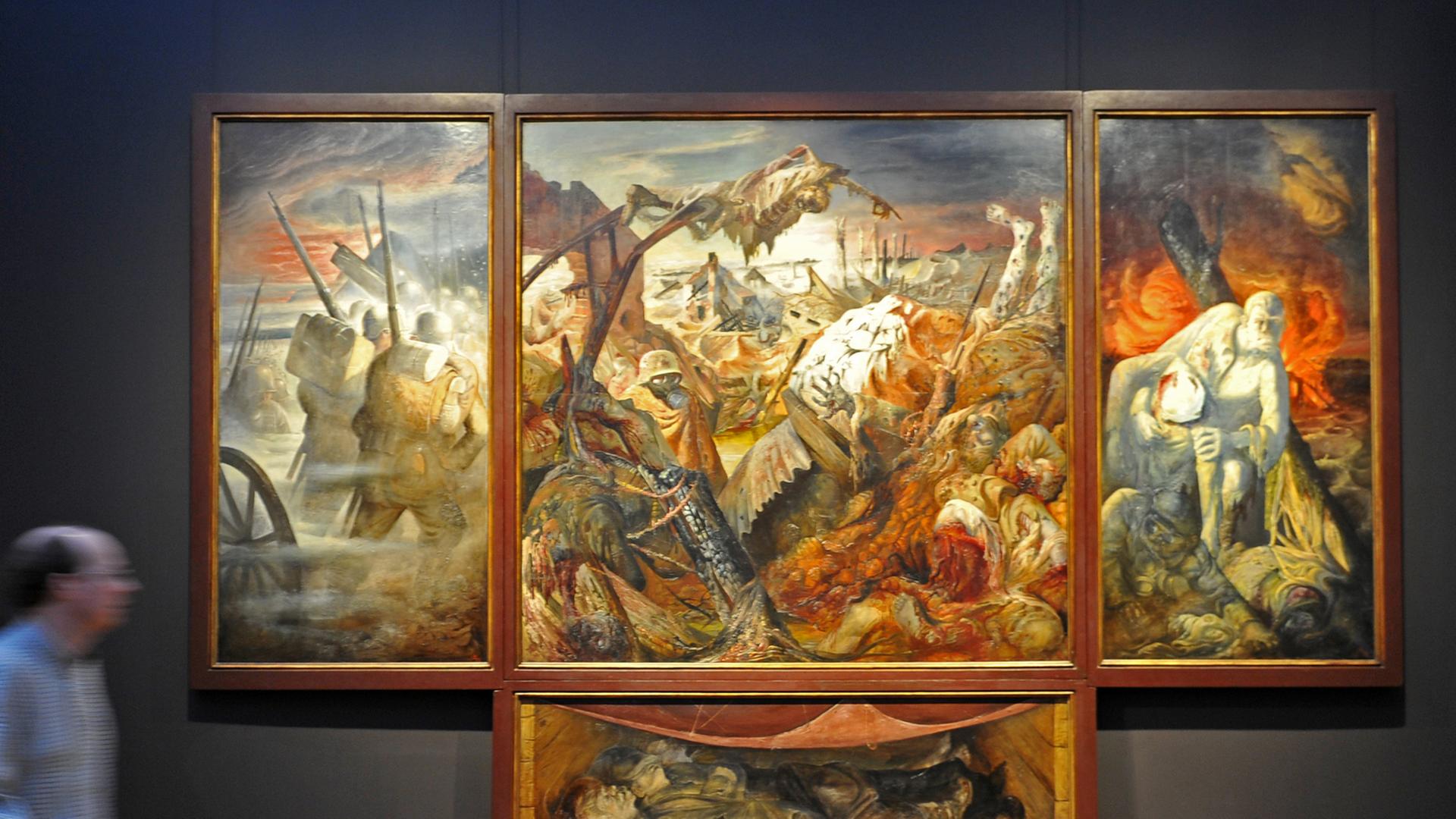 Das Triptychon "Der Krieg" von Otto Dix hängt am 04.04.2014 in Dresden in der Sonderausstellung der Staatlichen Kunstsammlungen im Albertinum. Das Triptychon "Der Krieg" von Otto Dix hängt am 04.04.2014 in Dresden in der Sonderausstellung der Staatlichen Kunstsammlungen im Albertinum.