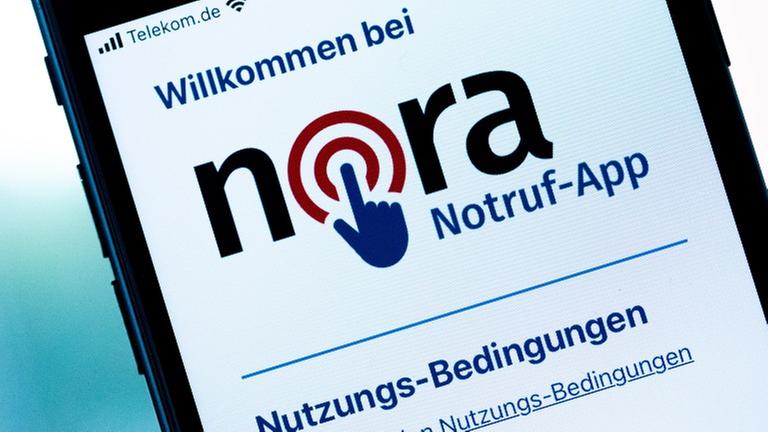Man sieht die Nora-App auf einem Handy-Bildschirm. Man sieht die Nora-App auf einem Handy-Bildschirm.