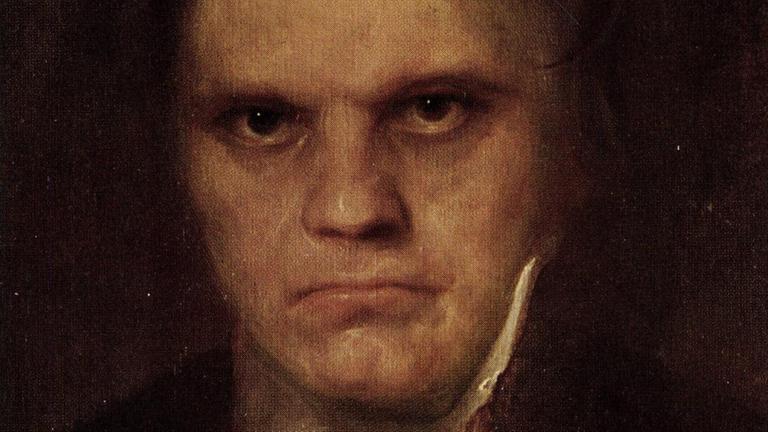 Porträtzeichnung eines älteren Mannes mit wildem Haar und dunklen Augen. Porträtzeichnung eines älteren Mannes mit wildem Haar und dunklen Augen.