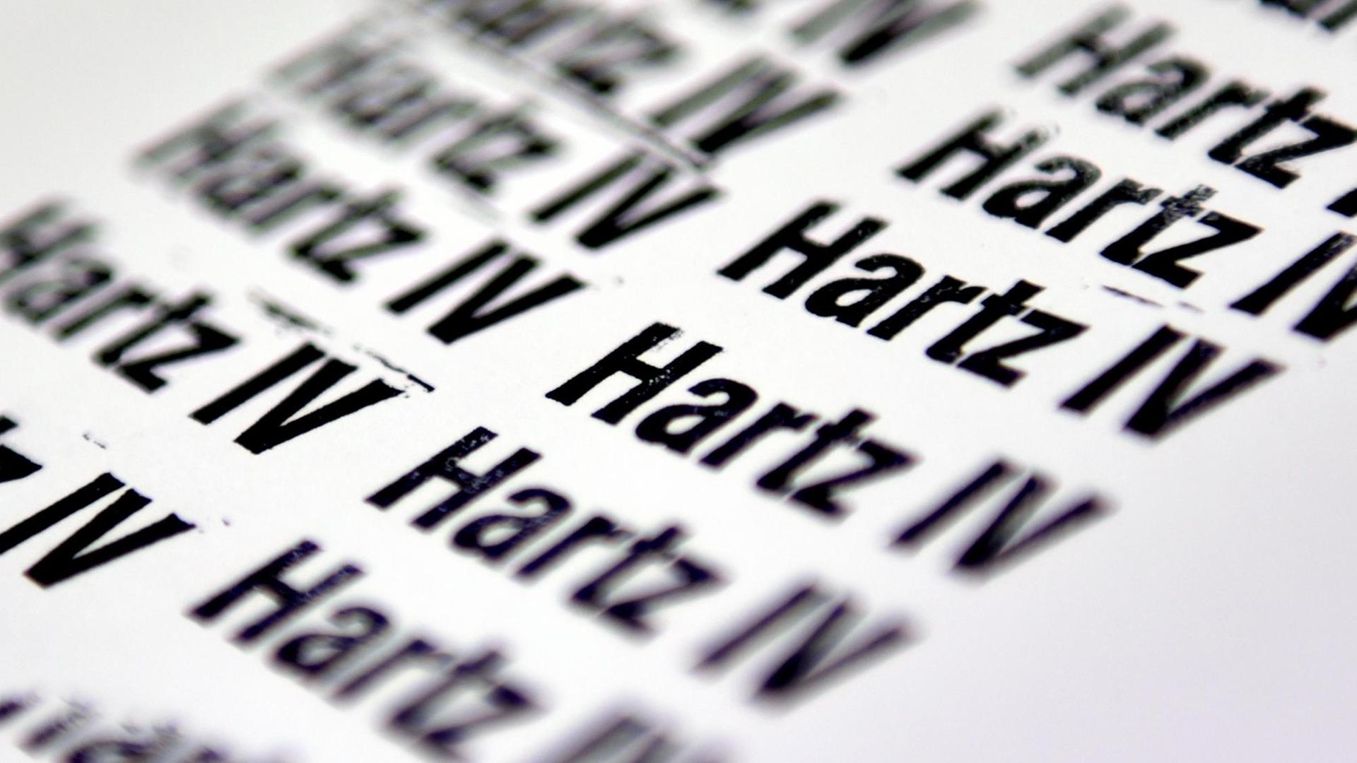 Der gestempelte Schriftzug Hartz IV Der gestempelte Schriftzug Hartz IV