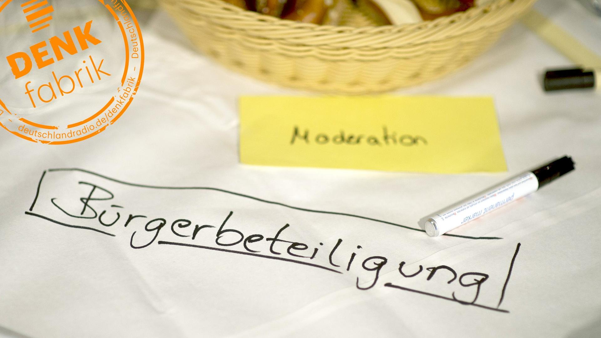 Bürgerbeteiligung steht auf einem Blatt Papier. Bürgerbeteiligung steht auf einem Blatt Papier.