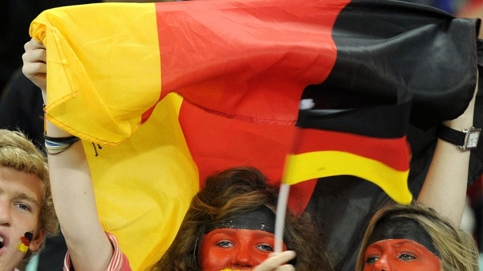 Germany supporters cheer during a World Cup semifinal against Spain at Durban Stadium in Durban, South Africa, on July 7, 2010. Spain won 1-0. Germany supporters cheer during a World Cup semifinal against Spain at Durban Stadium in Durban, South Africa, on July 7, 2010. Spain won 1-0.