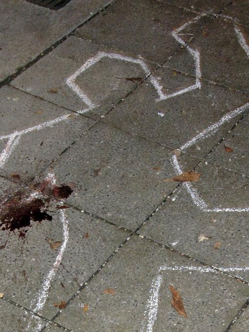 Tatort-Skizze einer Leiche anlässlich einer Lesung.