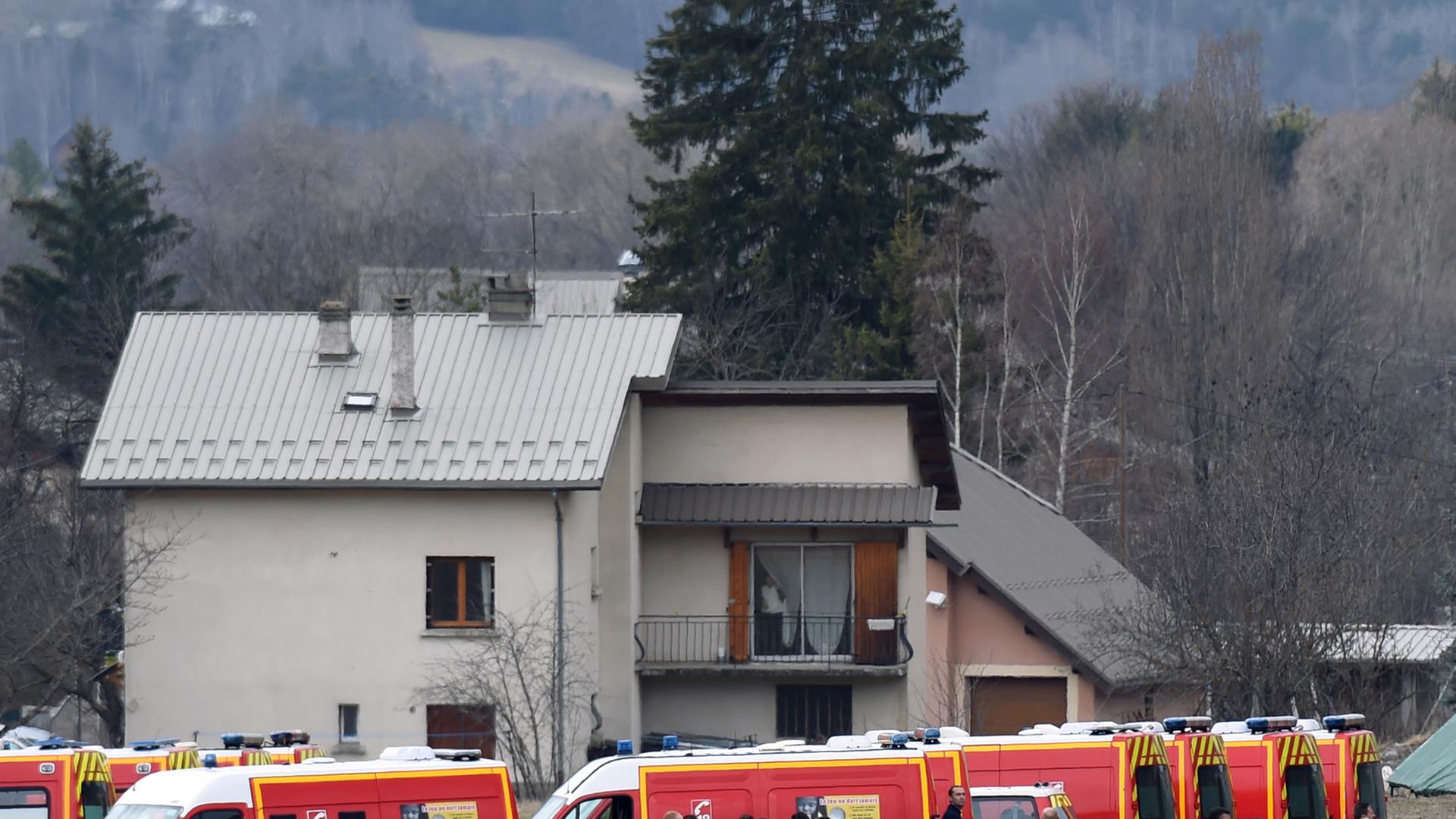 French emergency services workers gather in Seyne, south-eastern France, on March 24, 2015, near the site where a Germanwings Airbus A320 crashed in the French Alps. A German airliner crashed near a ski resort in the French Alps on March 24, killing all 150 people on board, in the worst plane disaster in mainland France in four decades. AFP PHOTO / BORIS HORVAT French emergency services workers gather in Seyne, south-eastern France, on March 24, 2015, near the site where a Germanwings Airbus A320 crashed in the French Alps. A German airliner crashed near a ski resort in the French Alps on March 24, killing all 150 people on board, in the worst plane disaster in mainland France in four decades. AFP PHOTO / BORIS HORVAT